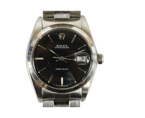 ROLEX; a gentleman's stainless steel Oyster Date Precision wristwatch, with baton markers to the black dial and with correct 