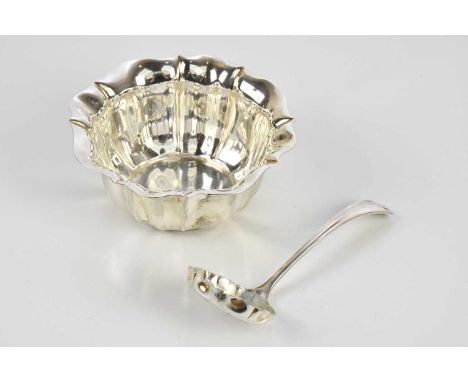 AITKEN BROTHERS; a George V hallmarked silver bowl with scalloped edge, Sheffield 1910, and a hallmarked silver sifting spoon