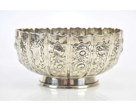 EDWARD FARRELL; a William IV hallmarked silver bowl with panelled decoration, each panel decorated with repoussé floral spray