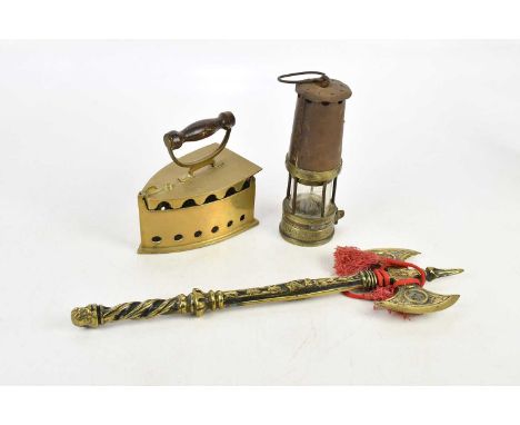 A Davy miner's lamp, a brass iron and a decorative brass axe (3). 