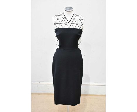 VICTORIA BECKHAM; a black cotton midi length shift dress, with a geometric triangle pattern to shoulders, fitted waist and fu
