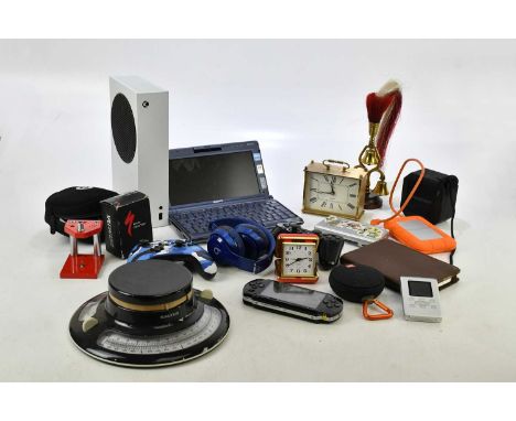 An Xbox Series S console, Sony Vaio Notebook, PSP, JBL speakers, Beats Solo ear headphones, PlayStation/Xbox controllers etc 