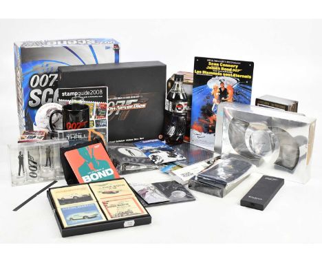 JAMES BOND; a group of modern collectables including playing cards, booklets, DVDs boxes, a bottle of Coke Zero, a large sele