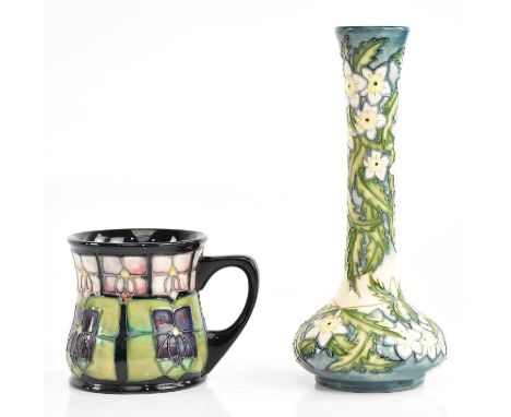 RACHEL BISHOP FOR MOORCROFT; a limited edition squat vase with elongated neck, decorated in the 'Baby Blue Eyes' pattern, num