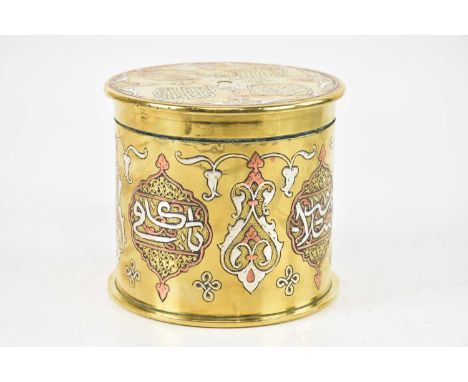 A WWI trench art artillery shell jar and cover, with white metal, copper and brass Cairo Ware type decoration inscribed 'Dama