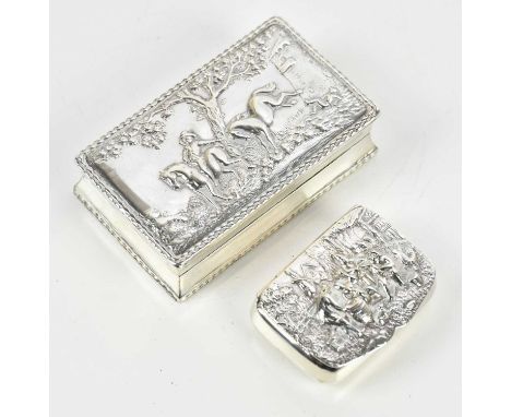 An Edward VII imported hallmarked silver rectangular snuff box, the cover with repoussé decoration of a figure on horseback b