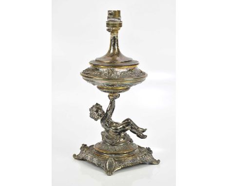ELKINGTON &amp; CO; a Victorian hallmarked silver figural oil lamp and associated white metal cover, representing a cherub su