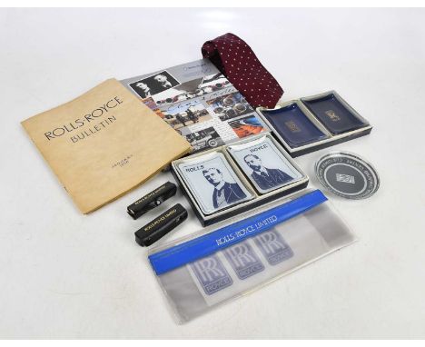 ROLLS-ROYCE INTEREST; a small collectors' lot including nine glass ashtrays, dice, a '1904-2004 History of Rolls-Royce' book,