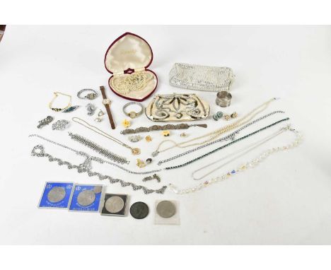 A quantity of costume jewellery, a napkin ring, three watches, coins, necklaces, etc.
