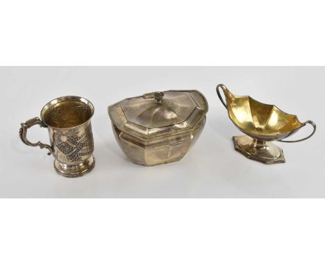 THOMAS PRIME &amp; SON; a Victorian hallmarked silver christening mug with embossed decoration and vacant cartouche, Birmingh