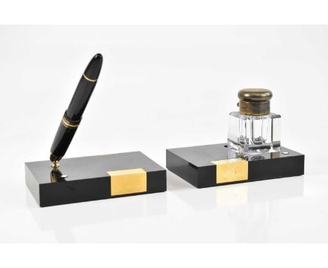 MONTBLANC; a 4810 fountain pen with 14K nib, on grand stand, and matching Montblanc glass inkwell with brass cover, on grand 