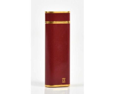 CARTIER; a cigarette lighter, serial no. 58325M.Condition Report: There are no papers or boxes. The lighter is presently empt