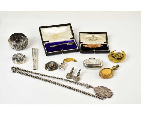 A Victorian yellow metal brooch set with central clear stone, a Victorian locket, a brooch made from pocket watch movements, 