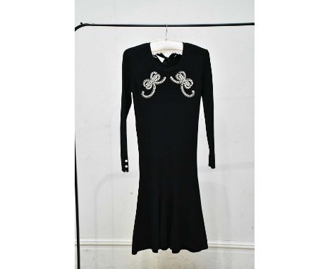 FENDI; a black mid length knitted midi dress, with faux pearl ribbon embellishment design to front and black ribbon tie to to