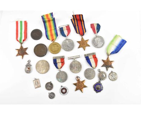 A WWI Victory Medal awarded to 76096 Gunner G Molyneux Royal Artillery, and five WWII medals comprising the 1939-45 Medal, th