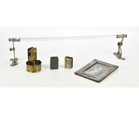 An Arts and Crafts style sheet pewter photograph frame, with Ruskin style cabochon, with central watercolour panel of a maide