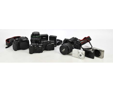 CANON; an EOS 70D camera with zoom lens, a 550D camera body, additional Canon lens, Canon G16 digital camera, Nikon Coolpix, 