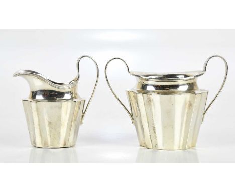 THOMAS BRADBURY &amp; SONS; an Edward VII hallmarked silver twin handled sugar bowl and cream jug, Sheffield 1901, approx 8.6