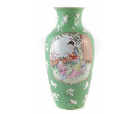 Chinese famille rose vase, painted with figures in garden scenes within raised gilded cartouches on a green ground with raise