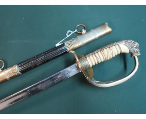 Circa WWI German navel officers sword with 31" slightly curved blade, double edge end section marked E &amp; F Horster Soling