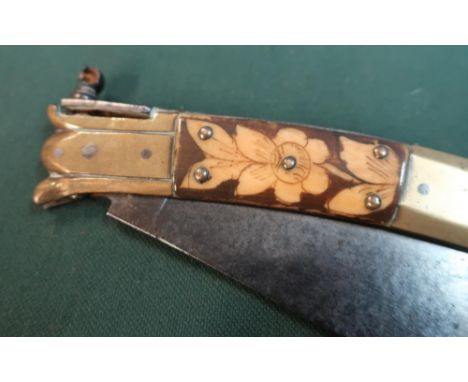 19th C Spanish Navaja folding 5 1/2inch steel blade slightly curved. 7inch bone handle brown with cream floral decoration. Br