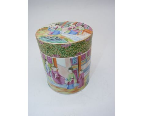 A Chinese Famille Rose porcelain lidded Tea Caddy in cylindrical form depicting ladies and gentlemen in a courtyard scene, 4"