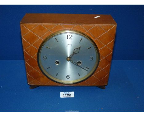 A Smiths vintage striking Mantel Clock with key, 9'' wide x 8'' high.