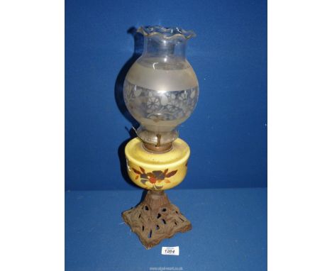 An old Oil Lamp with square metal base, ceramic reservoir and etched glass shade, 18'' tall.