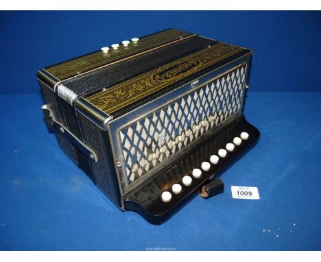 A contemporary Hohner Accordion, 12/4 buttons.