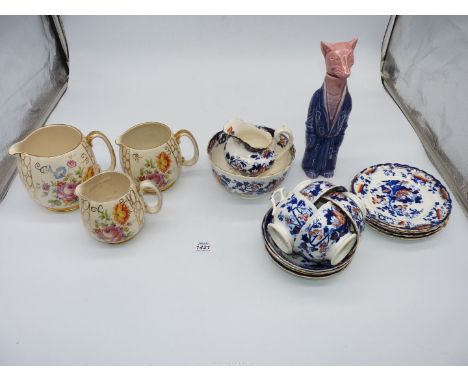A quantity of china to include graduated three piece floral patterned Sadler jugs, ceramic Fox decanter and a fourteen piece 