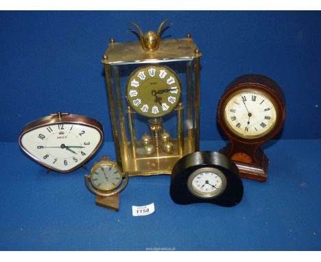 Four small mantle clocks to include Ebony clock, Edwardian Mahogany balloon clock (cracks to face), desk top Thermometer and 