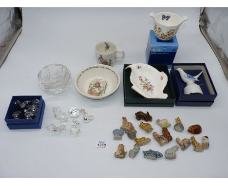A small quantity of china including Wedgwood Peter Rabbit mug and bowl, boxed Minton dish, Wade Whimsies, Waterford bowl, Swa