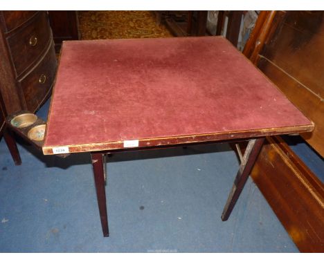 A folding legged square Card Table having swing out, double tray holders to each corner, 30 1/8" x 30 1/8" x 24 1/4" high.