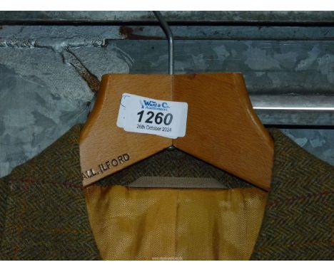 A Gents Magee sports Jacket, pure wool, in mustard with orange and yellow checks,46" chest, a pair of camel colour trousers, 