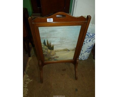 A Firescreen with a hand embroidered scene of an Italian Lakeland landscape with two covered boats near to a boathouse and we
