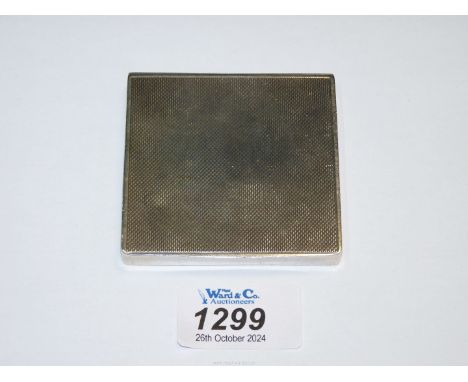A Silver powder Compact, London 1945, makers Asprey & Co Ltd., 75 grams excluding mesh.