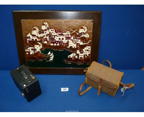 A vintage Canadian Kodak black box camera with original canvas carrying case,  plus an enamel on beaten copper plaque, mounte
