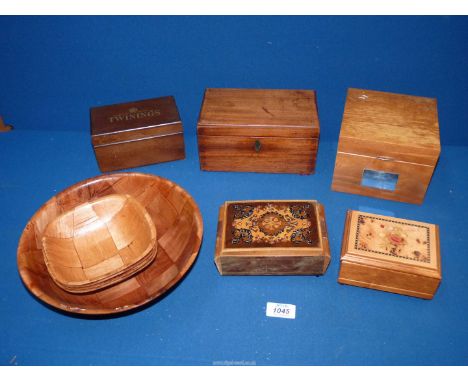 A turned bowl and four smaller matching dishes, a rectangular box, a satinwood jewellery box, an Art Deco box, a Twinnings te