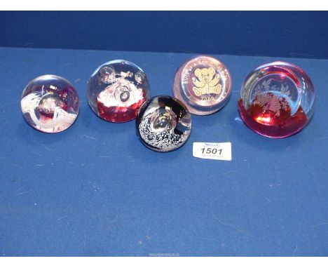 Five Caithness glass paperweights to include: "Moonstone", "Tango", "Birth of a New Millennium 2000", etc.