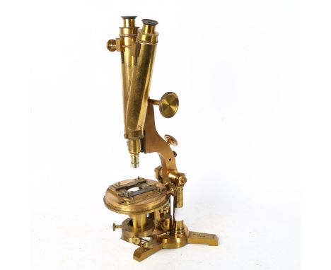 A large 19th century lacquered brass binocular compound microscope, by R &amp; J Beck Ltd of London, no. 29117, signed on bas