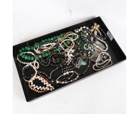 A tray of silver-mounted and other jewellery, pearl bracelets, a green stone necklace etc 