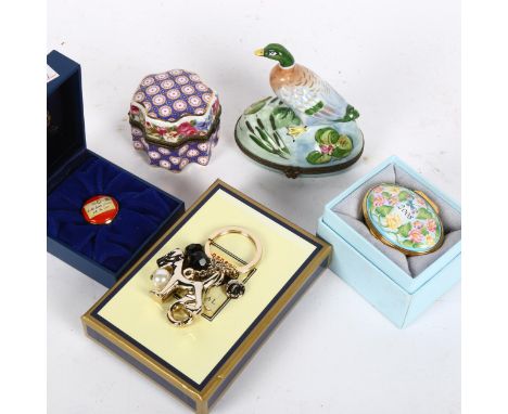 2 Halcyon Days enamel boxes, boxed, an Aspinal of London keyring, a Limoges enamelled trinket box and cover surmounted by a d