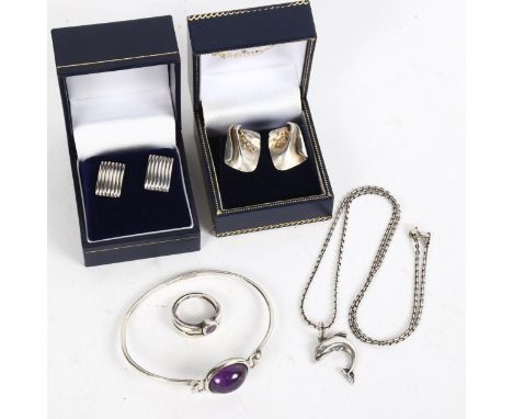 A group of silver jewellery, to include earrings, amethyst set bangle and ring, dolphin necklace etc 