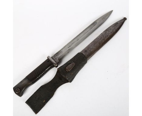 A German 1898 pattern bayonet and scabbard, no. 7068, blade length 25cm, with black leather frog 