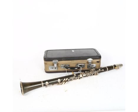 A Chinese Hsinghai 4-section clarinet, in fitted hardshell case 