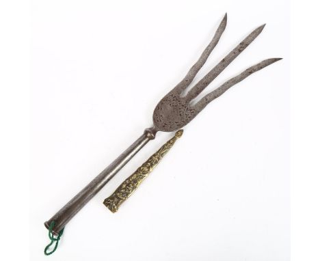 A 19th century Middle Eastern steel Trident head, length 50cm, and a relief cast-brass dagger scabbard 