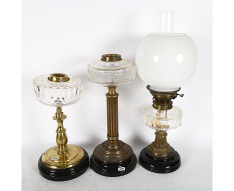 An Antique oil lamp. with chimney, shade and cut-glass font, height 52cm 