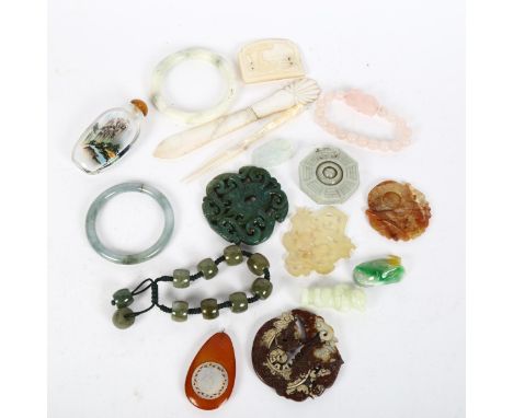 A group of Oriental items, including jade bangles, Peking glass snuff bottle, beads etc 