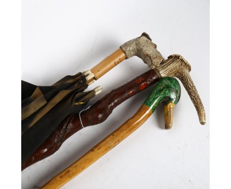 Staghorn-handled walking stick, another, and an umbrella with Terrier knop 