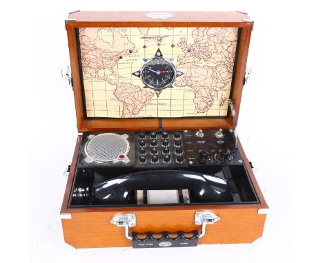 A reproduction "Spirit of St Louis", the first to fly non-stop solo across the Atlantic, cased field telephone 